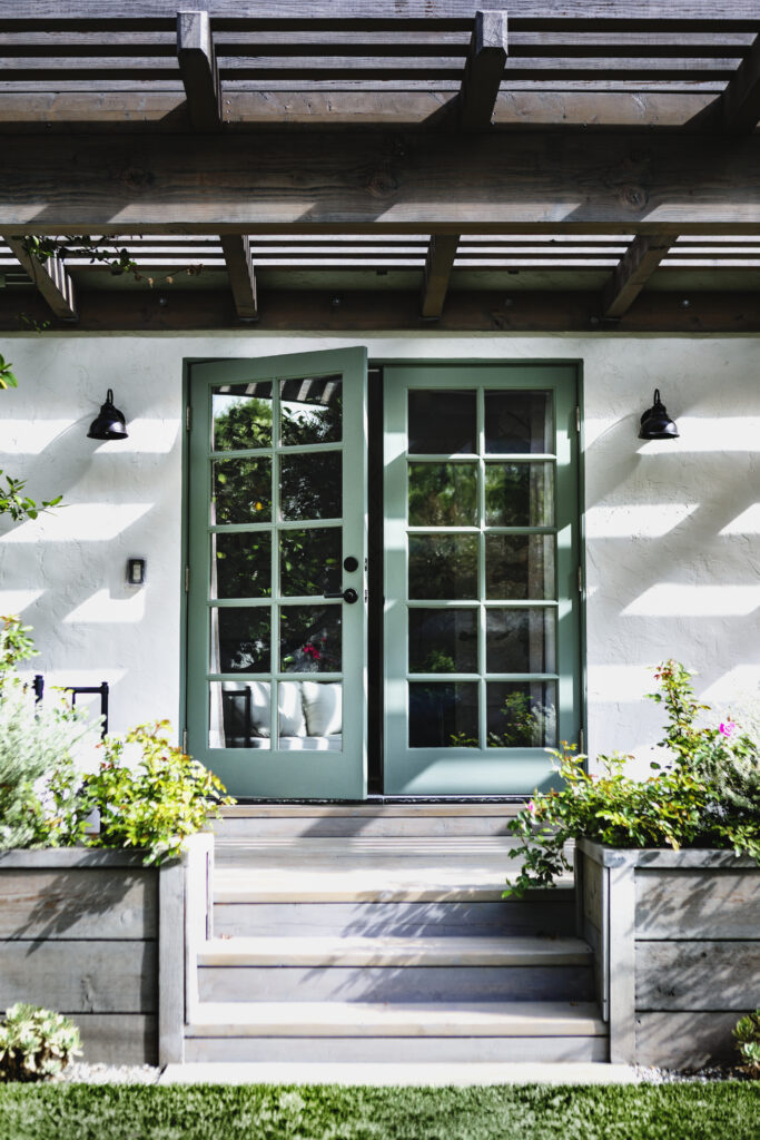 New patio doors open up the home to outdoor living and natural views.